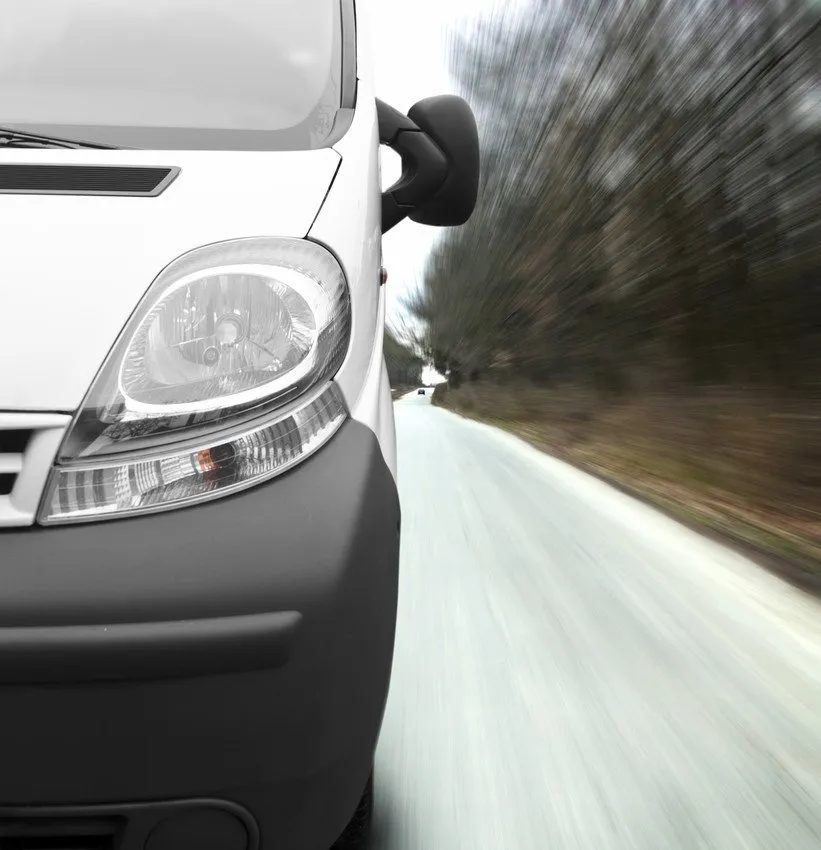 SD Auto Electrical Services white van on road